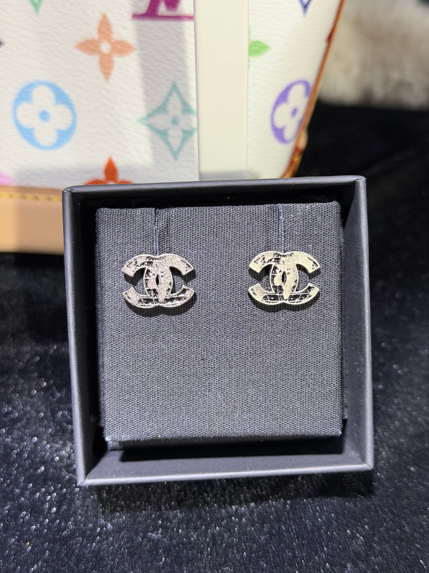 CHANEL GLOBE LOGO STUD EARRINGS