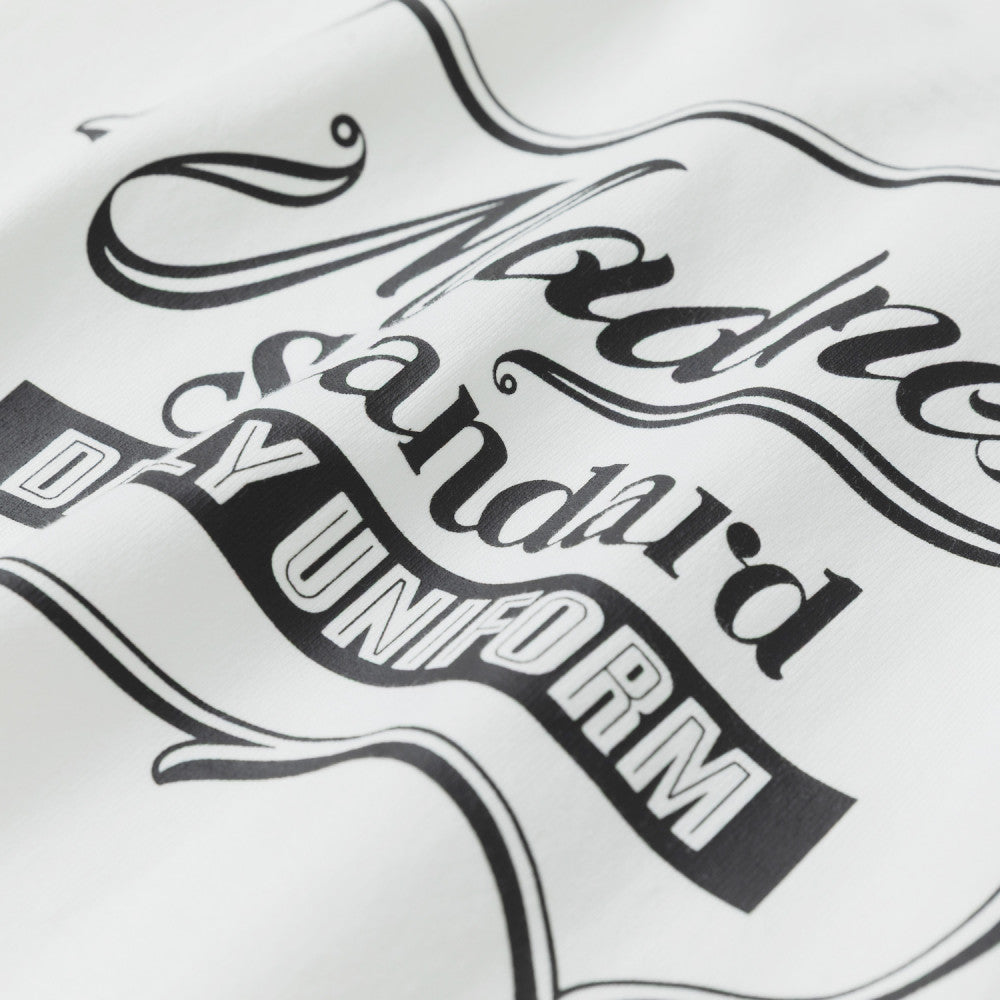 MADNESS BADGE (L) UNIFORM TEE